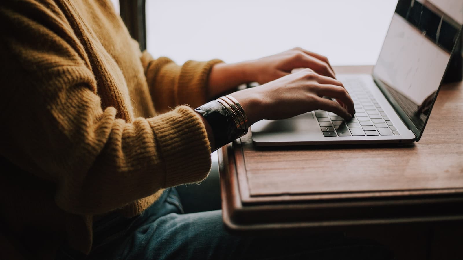 Best free AI tools for students — a student studying on a laptop