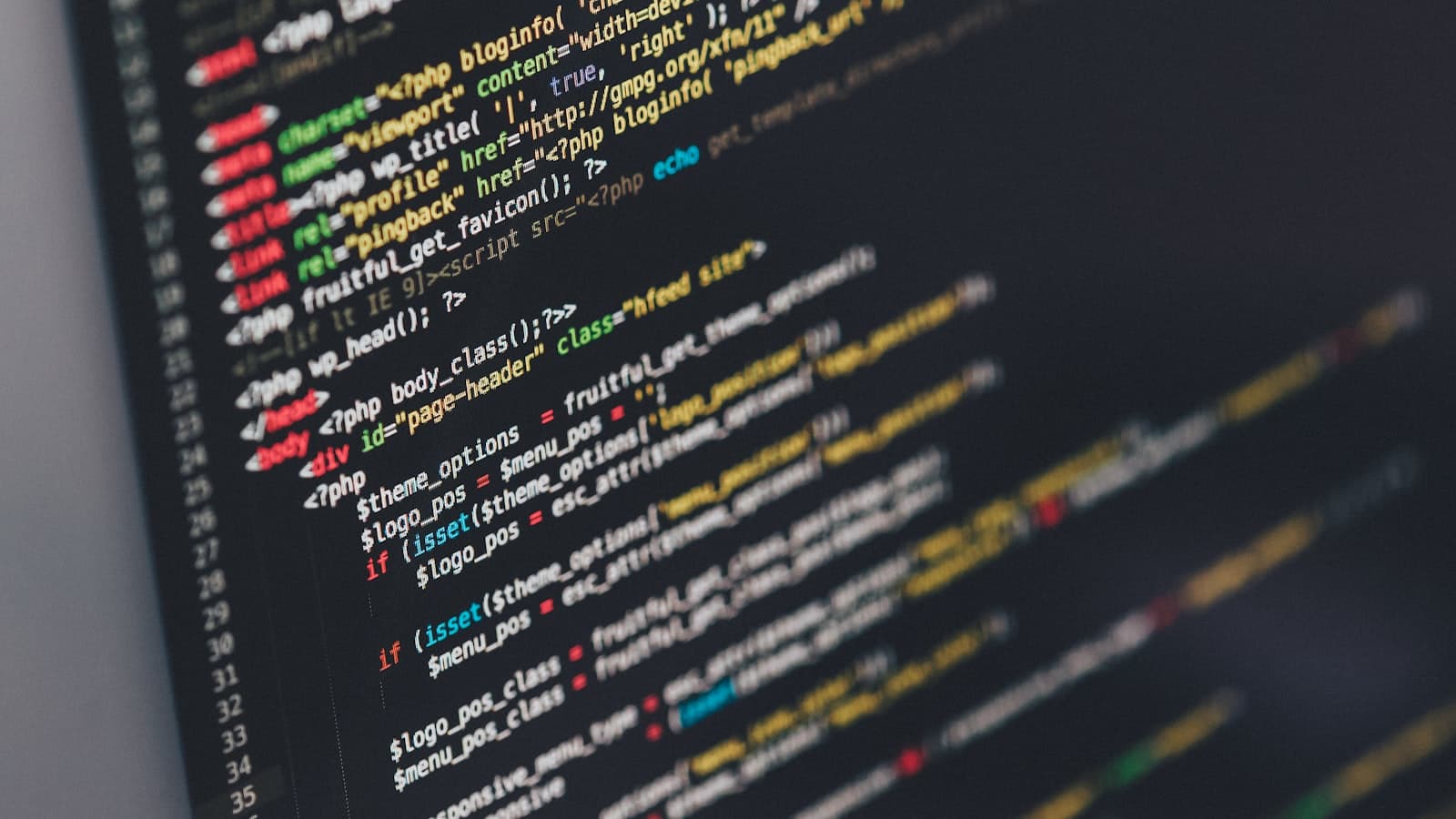 Best vibe coding tools 2026 — code on a software developer's monitor