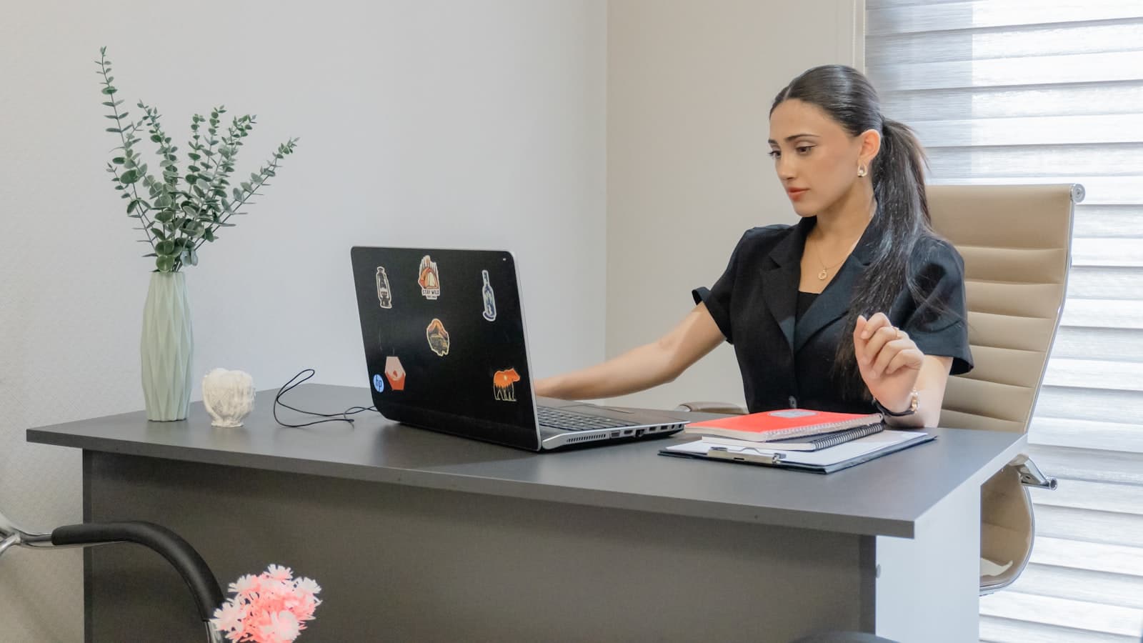 Future-proofing your tech career — a woman working at an office desk