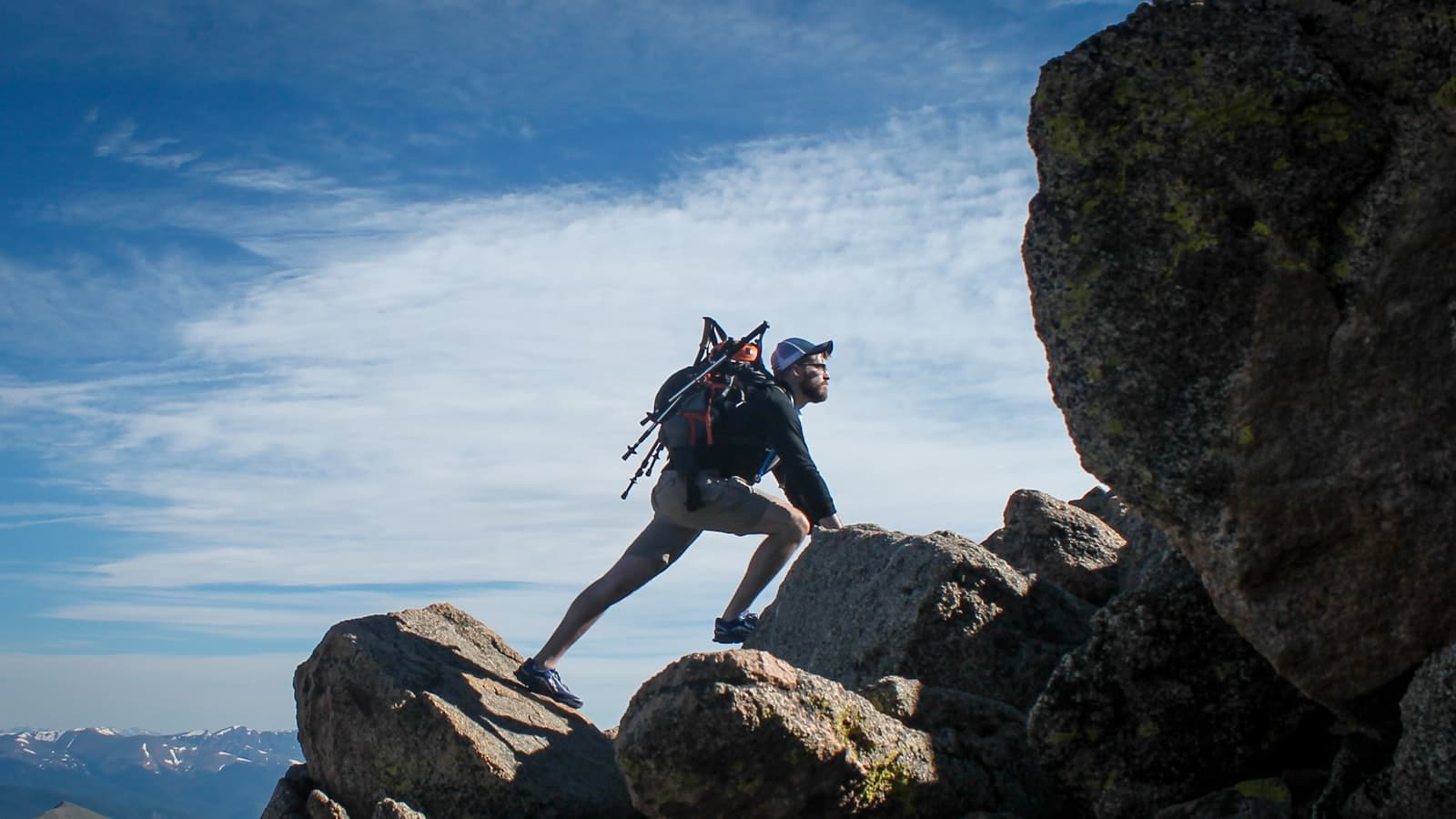Staying motivated — a man climbing a mountain