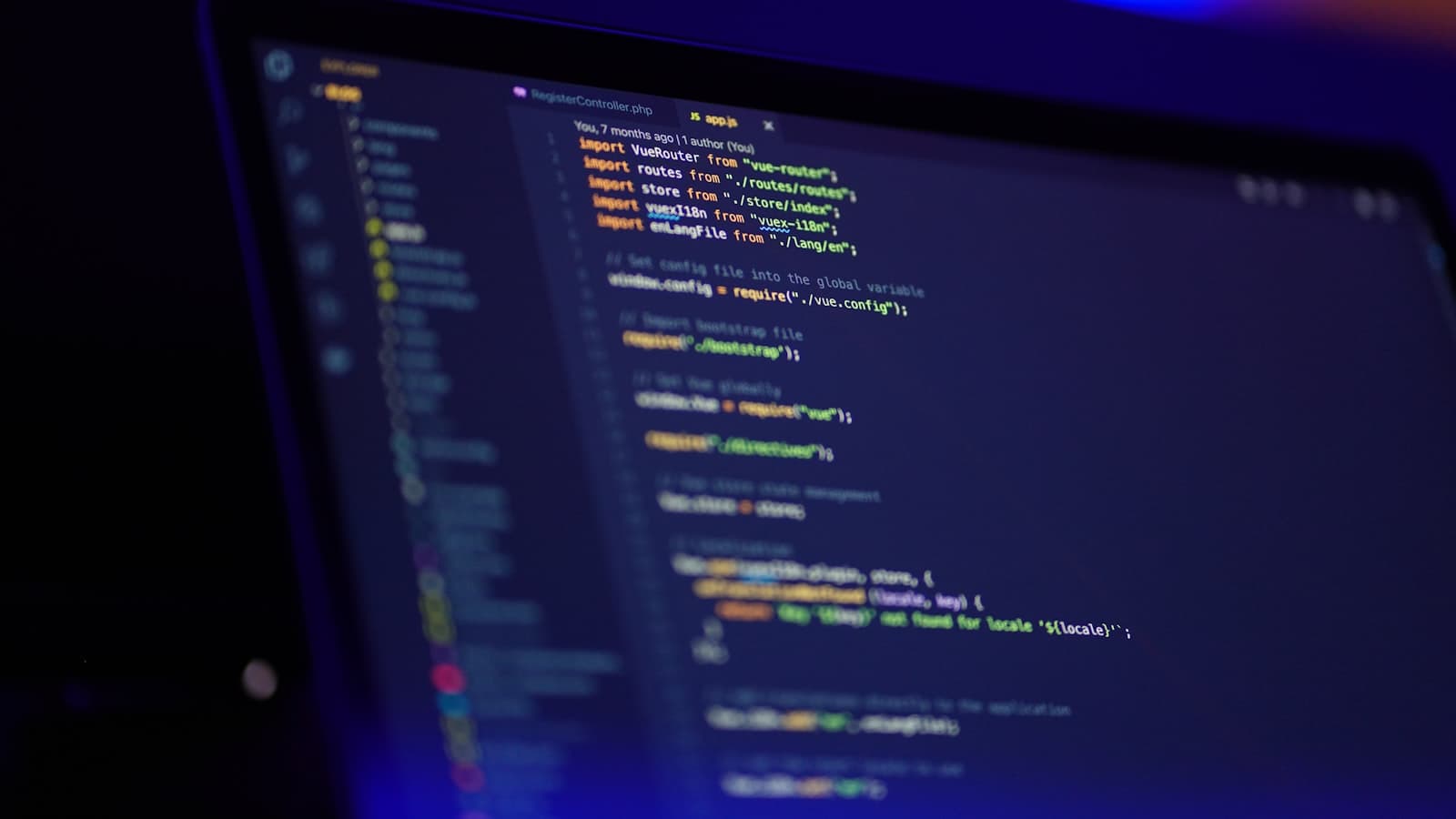 Git and GitHub explained — colorful code on a laptop screen