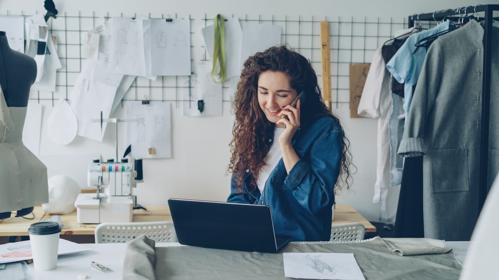 Best AI tools for small business — an owner working on a laptop