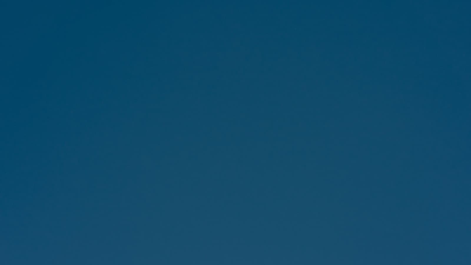 Is AI the antichrist — a church cross against a blue sky